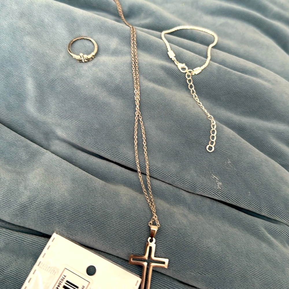 A ring, necklace, brac
